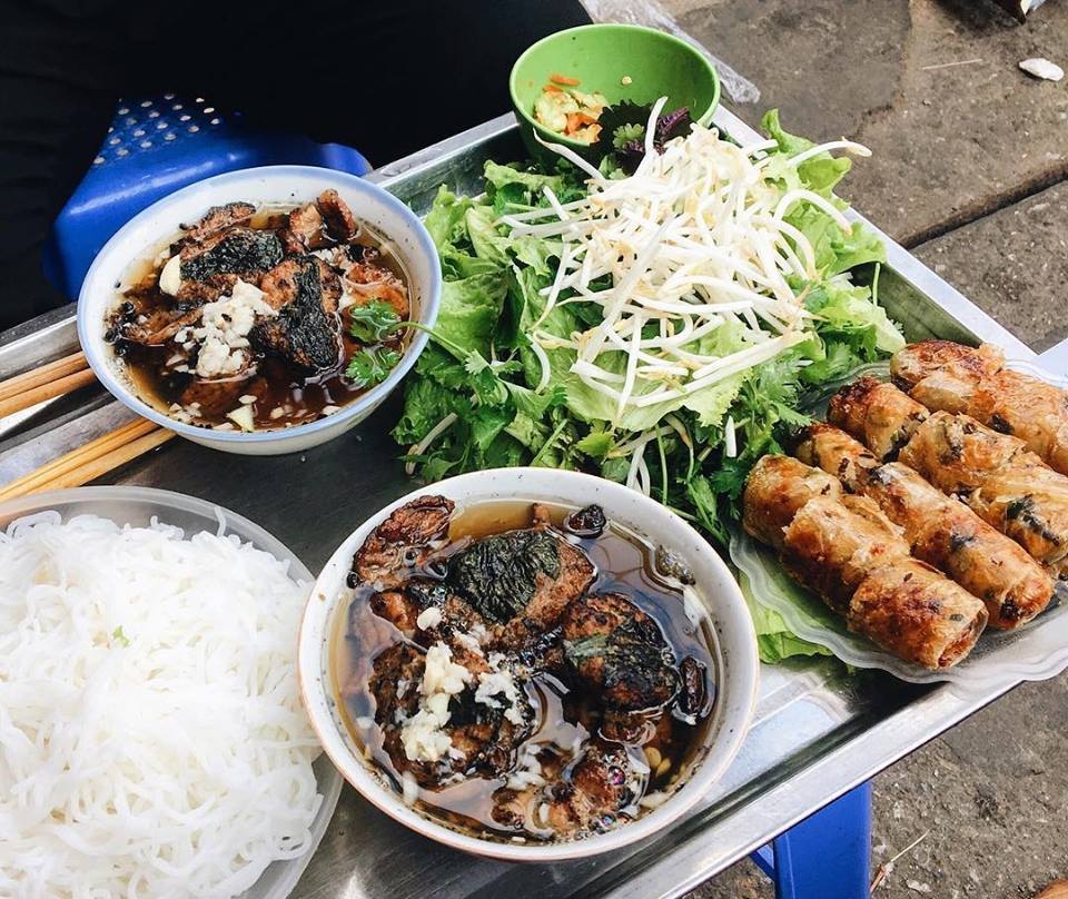 Capture the savory essence of Hanoi’s street food gem
